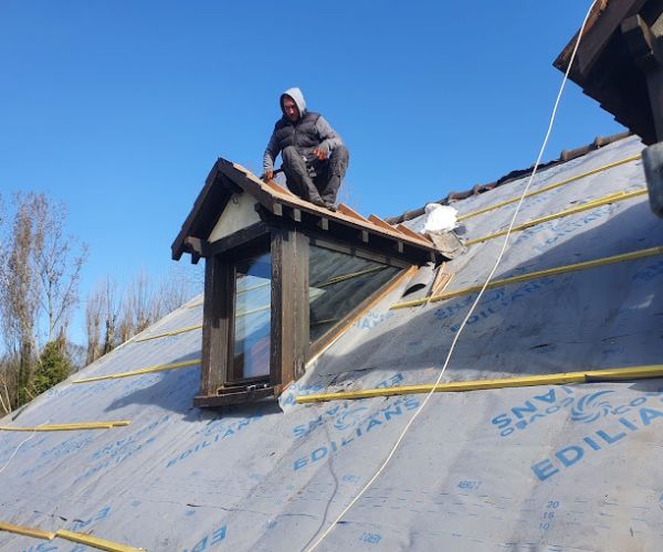 Pose de Velux avec écran sous-toiture en rénovation